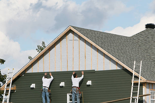 Professional Siding technician working in Spring, TX